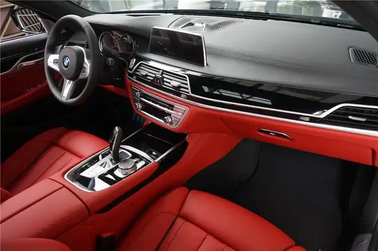 宝马740lixdrive尊享型蓝晶黑云锦红现车优惠25万元