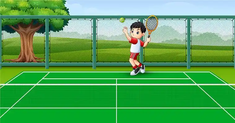 可爱的小男孩在球场上打网球图片