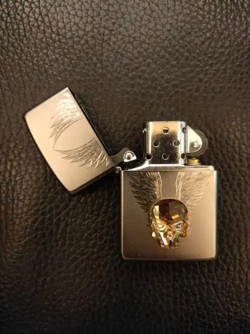 9zip49034 zippo金色翅膀骷髅