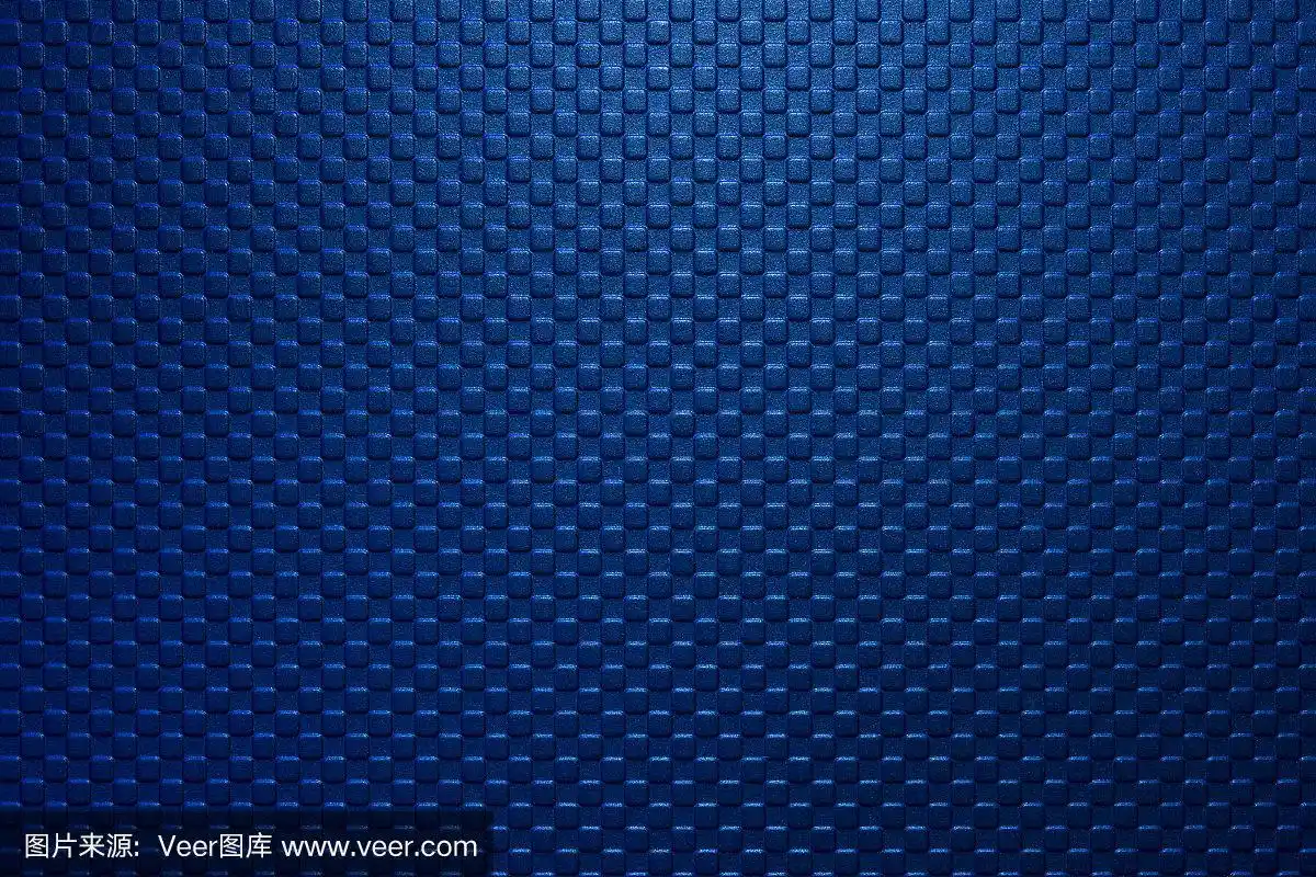 深蓝色的方块形状浮雕纹理背景与灯光在顶部.