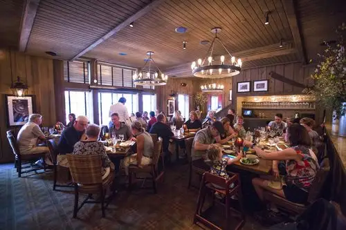 guests dining at the barn