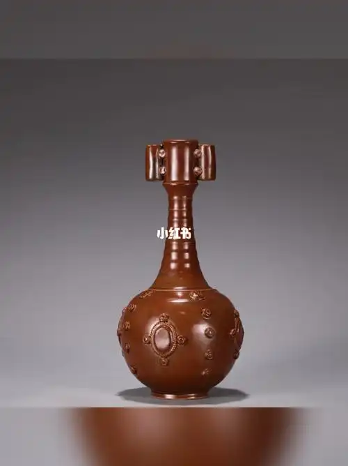 北宋定窑紫金釉贴塑罐耳瓶