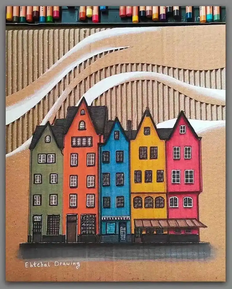 在快递纸板上绘画世界各地的建筑