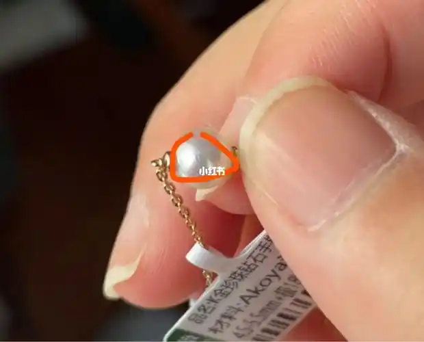 大家帮忙看看珍珠手链瑕疵