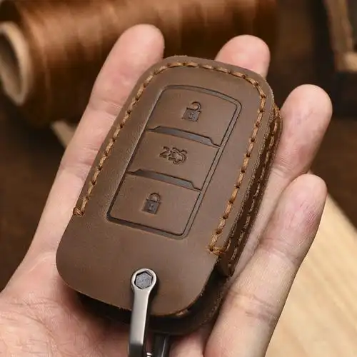 适用于长安cs75钥匙套逸动cs55plus欧尚蓝鲸cs35真皮汽车包扣壳