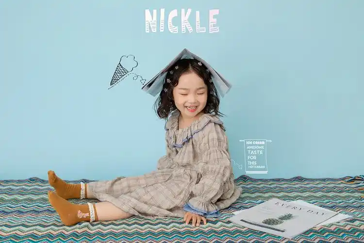 摄影师一笙的儿童摄影作品《可爱羊毛卷》