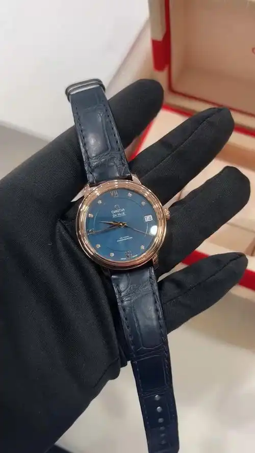 欧米茄蝶飞玫瑰金钻刻女表