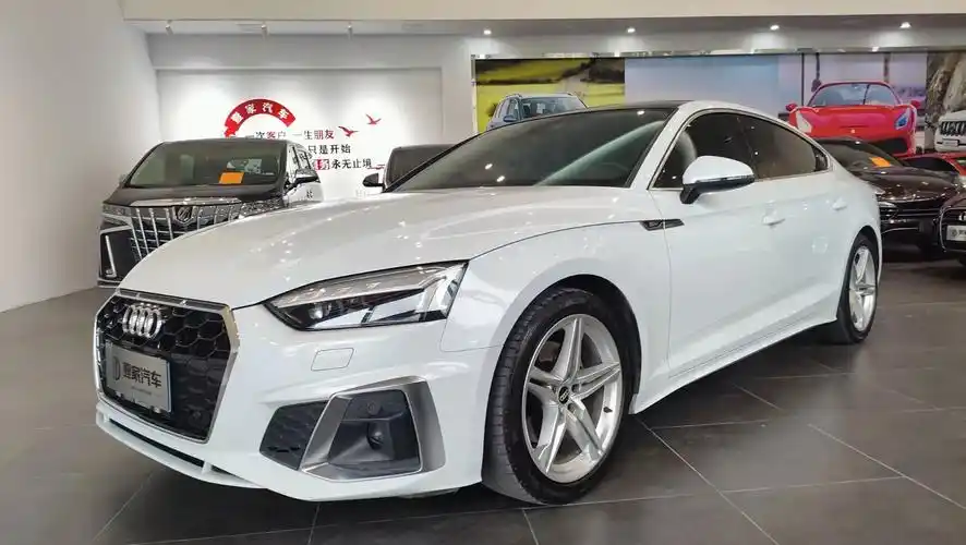 奥迪a5四门轿跑,2021年11月上牌,一手车实际公里就1. - 抖音